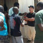 Local youths in argue with Golden Lead Factory owners, Gunjur, The Gambia